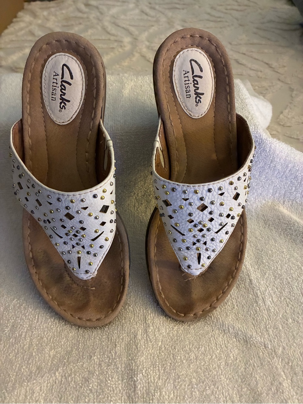 Artisan White leather Studded Thong Sandals laser-cut geometric patterns & studs